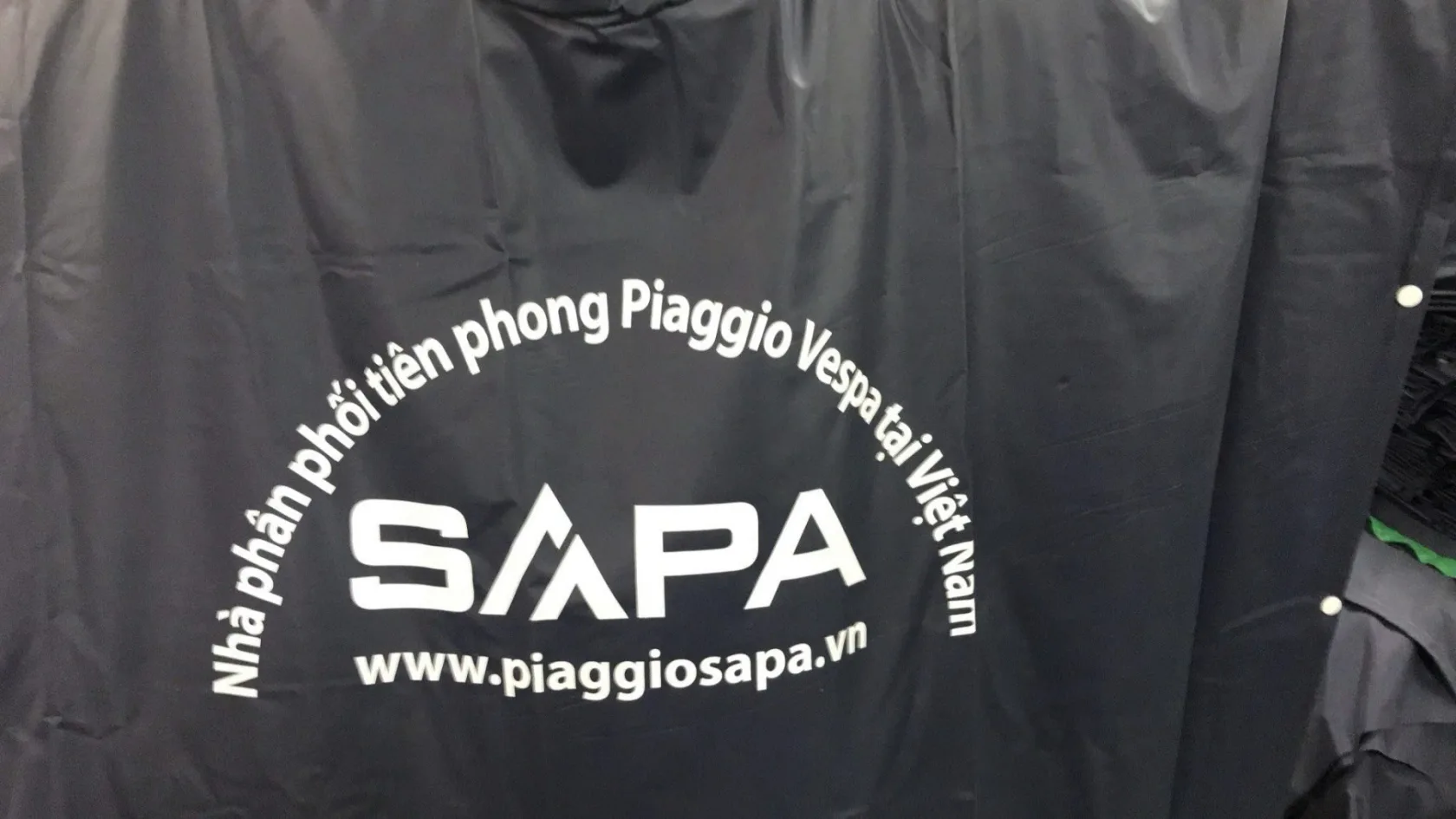 Áo mưa in logo Sapa - vải nhựa Rạng đông 1 áo mưa cánh dơi Poncho